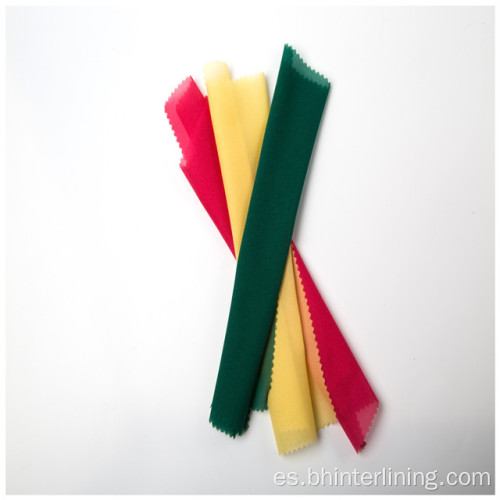Tejido de tejido interlinable fusible de colores para vestido.